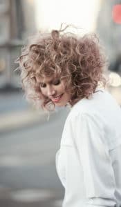 Strut Beautiful Blonde Messy Curls — Hair Services in Maroochydore, QLD