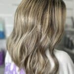 Grey/Blonde Mid Length Hair from the Side