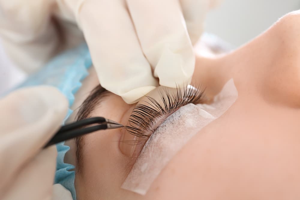 Young Woman Undergoing Procedure Of Eyelashes Lamination — Strut Hair & Beauty in Maroochydore, QLD