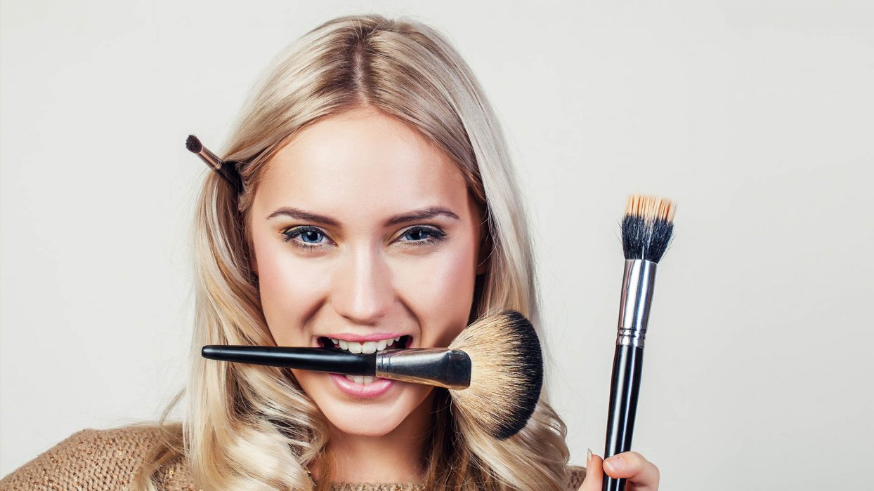 Woman with Brush — Hair Services in Maroochydore, QLD