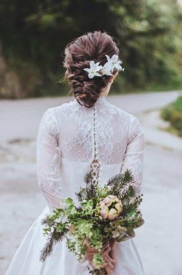 bride from the back with curly updo